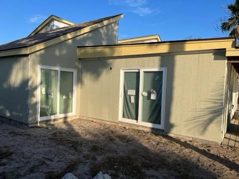 Back elevation, new patio doors